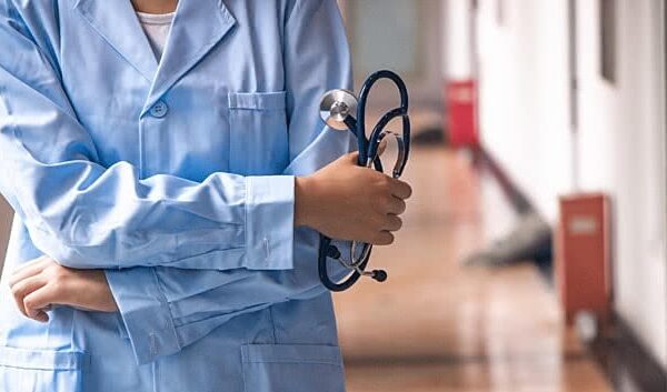 pngtree medical background of a doctor holding a stethoscope in the hospital image 754567 1